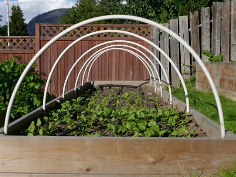 metal covered pvc hoop house|diy hoop house raised bed.